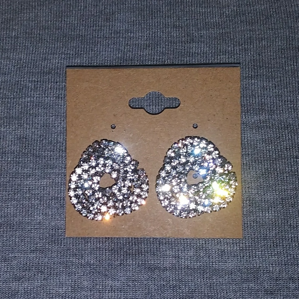 Crystal swirls w/ silver details.
